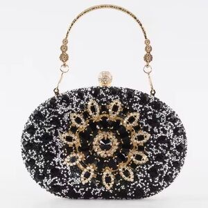 Beautiful Gold With Black Studded Crystal Clutch